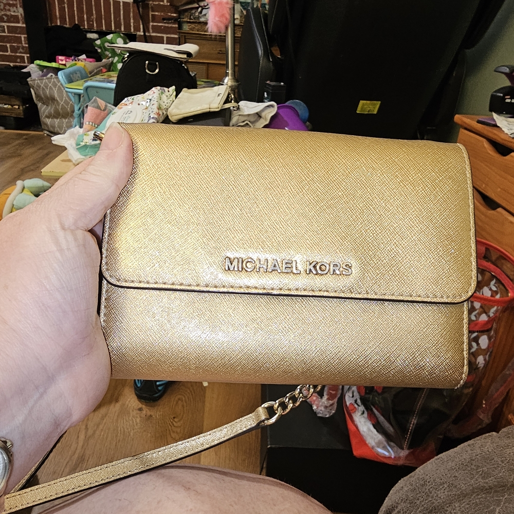 Michael Kors Gold Clutch Wristlet with Structured Design